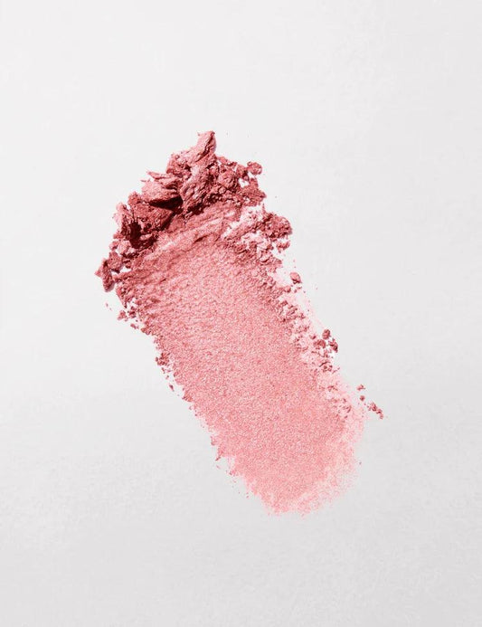 Swatch of bareMinerals Gen Nude Blonzer in Kiss of Rose, showcasing a silky pink and rosy bronze color.