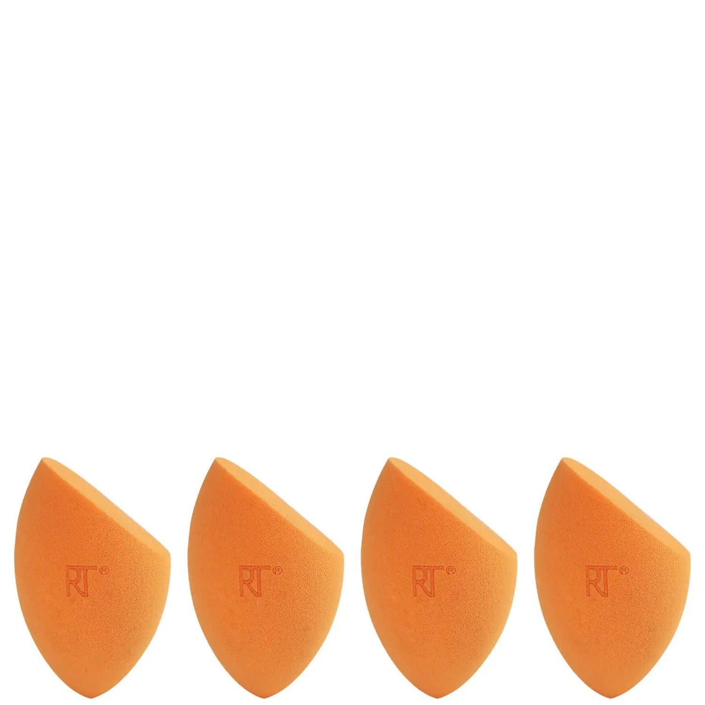 Real Techniques 4 Miracle Complexion Sponges in orange for seamless makeup blending and a smooth finish.