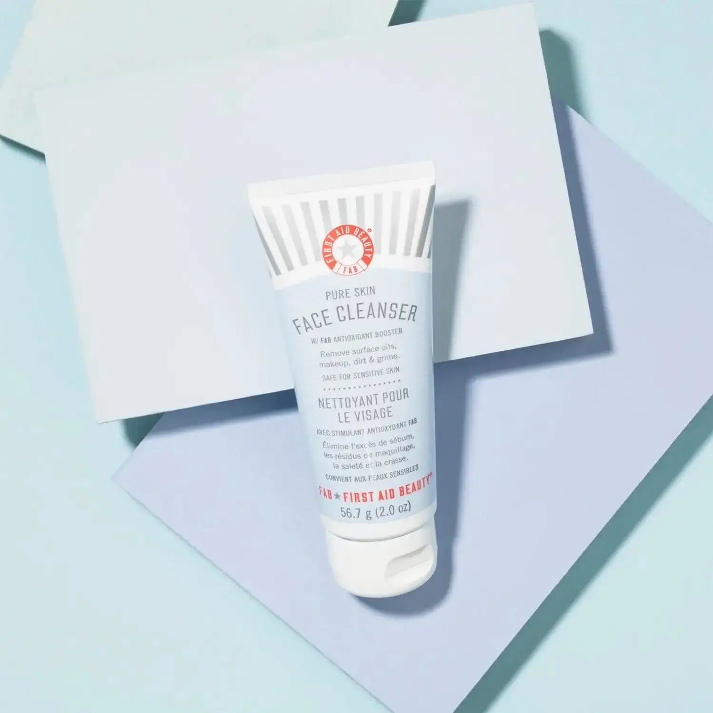 First Aid Beauty Face Cleanser 57g tube, designed for sensitive skin, removes impurities and brightens complexion.