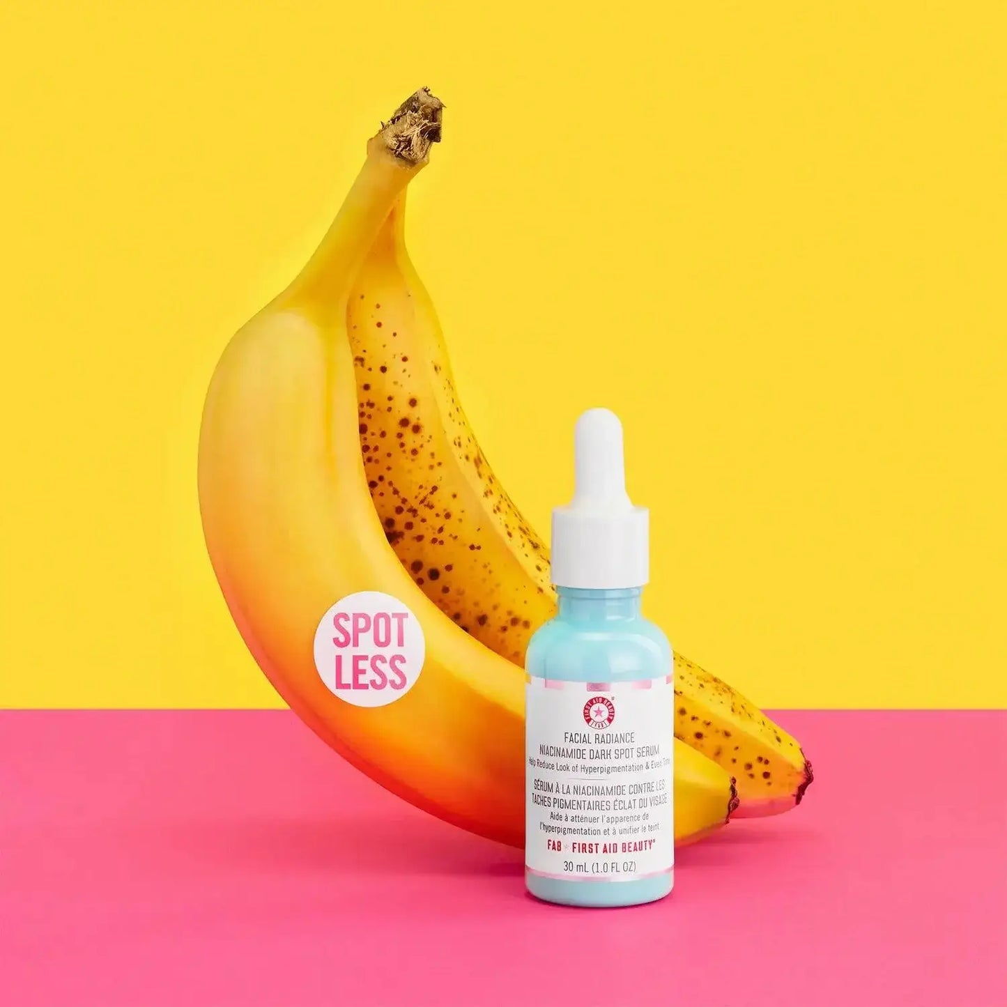 First Aid Beauty Facial Radiance Niacinamide Dark Spot Serum beside bananas, highlighting skin clarity benefits.