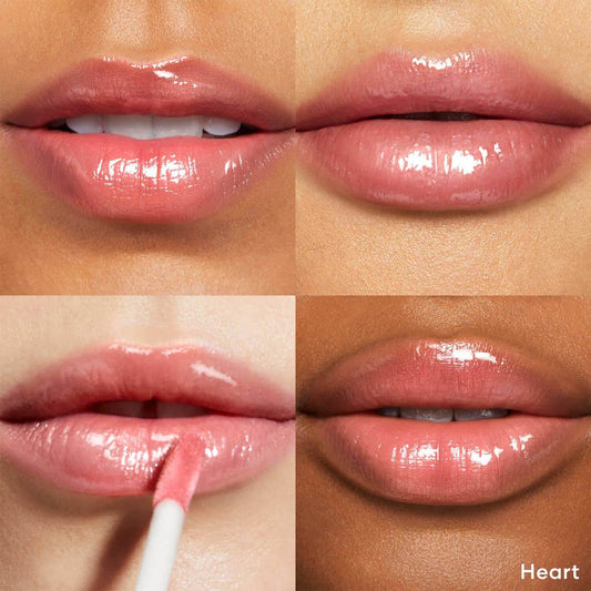 Close-up of lips showcasing bareMinerals Mineralist Gloss-Balm in Heart, highlighting glossy shine and sheer color.
