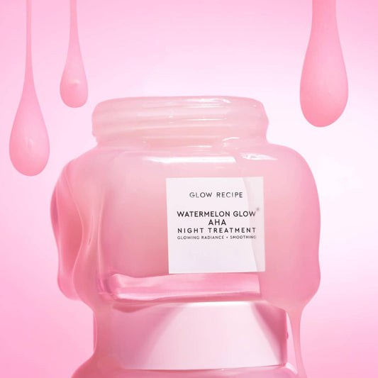 Glow Recipe Watermelon Glow AHA Night Treatment jar with dripping pink liquid, promoting glowing skin and hydration.