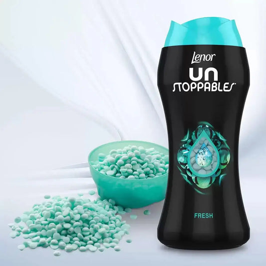 Lenor Unstoppables Fresh in-wash scent booster with turquoise granules for lasting freshness in laundry.