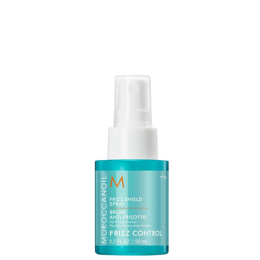 Moroccanoil Frizz Shield Spray in a 50ml bottle for frizz control and thermal protection, enriched with argan oil.