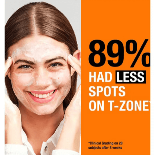 Smiling woman using NEUTROGENA Clear & Defend with text showing 89% had less spots on T-zone after 8 weeks.