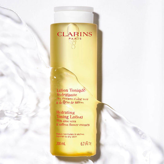 CLARINS Hydrating Toning Lotion for normal to dry skin, enriched with aloe vera and saffron for hydration and balance.