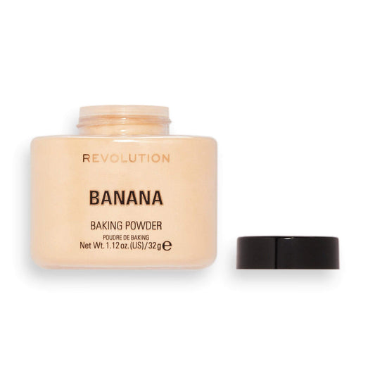 Makeup Revolution Banana Loose Baking Powder jar with black lid for brightening and shine control.