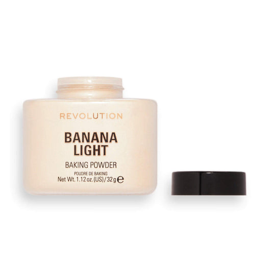 Makeup Revolution Loose Baking Powder in Banana Light, 32g jar for brightening and setting makeup.