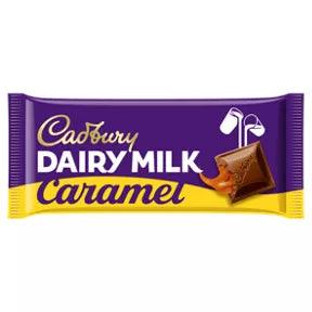 Cadbury Dairy Milk Caramel Chocolate Bar packaging featuring chocolate pieces and caramel design, suitable for vegetarians.