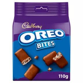 Cadbury Oreo Bites Chocolate Bag 110g with bite-sized chocolate pieces, suitable for vegetarians, may contain nuts.