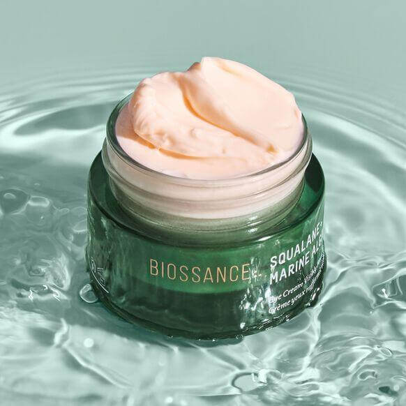 Biossance Squalane + Marine Algae Eye Cream in jar, offering hydration for dull skin and reducing fine lines.