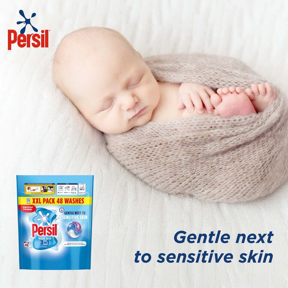 Persil 3 in 1 Washing Capsules Non Bio next to a sleeping baby, highlighting gentle cleaning for sensitive skin.