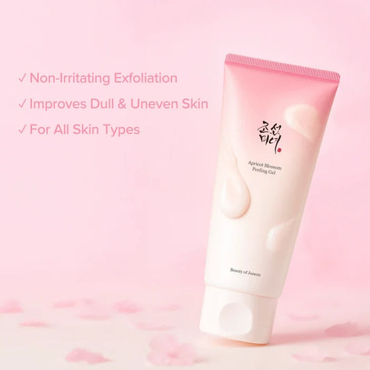 Beauty of Asana apricot blossom exfoliating facial gel in a pink and white squeeze tube, set against a soft pink background with decorative text highlighting its benefits.