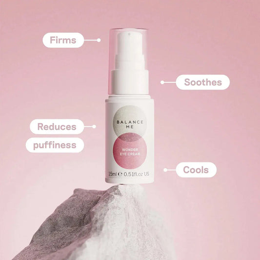 Balance Me Wonder Eye Cream 15ml, a revitalizing eye cream that firms, soothes, and reduces puffiness, featured on a stone surface.