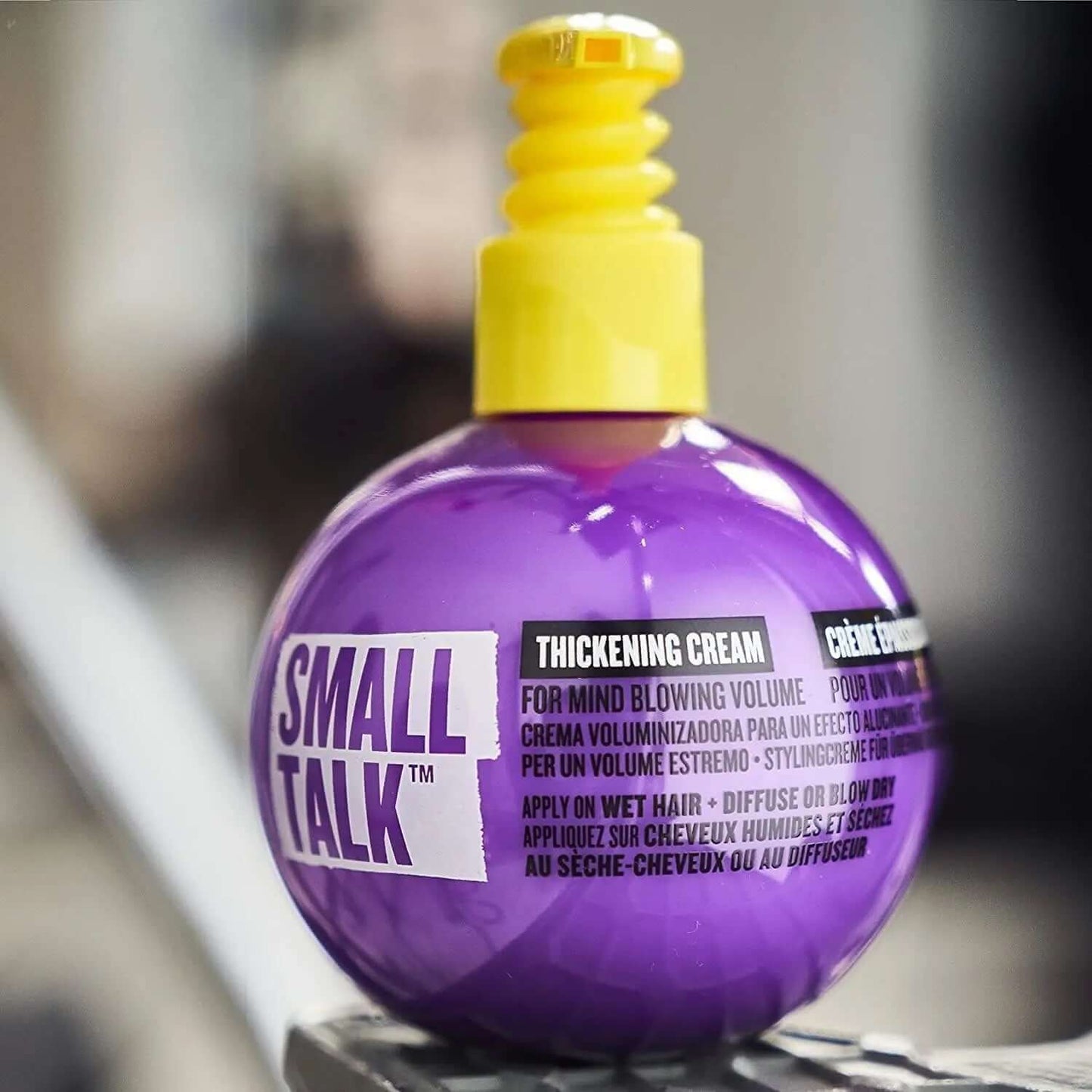 Bed Head Small Talk Hair Volume Styling Cream 240ml in a purple bottle for adding volume and thickness to fine hair.