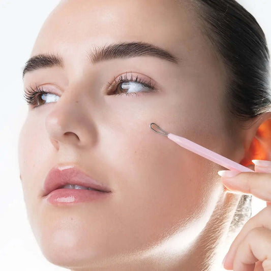 Woman using Brushworks Black Head Removal Tool for clear, blemish-free skin and effective blackhead removal.