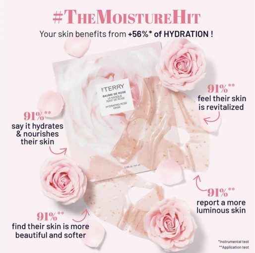 Advertisement for a By Terry skincare product with pink roses and text highlighting hydration benefits on a white background.