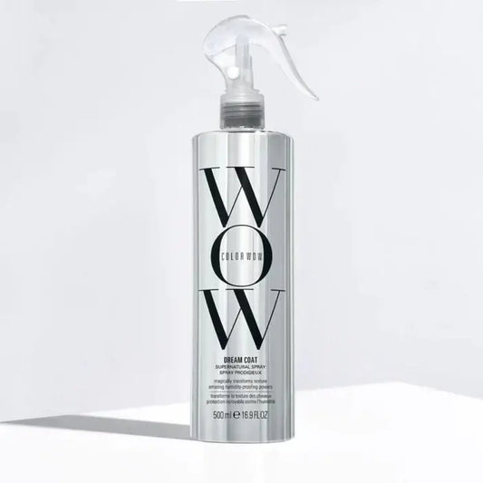 Silver bottle of WOW Color Coat on a white background