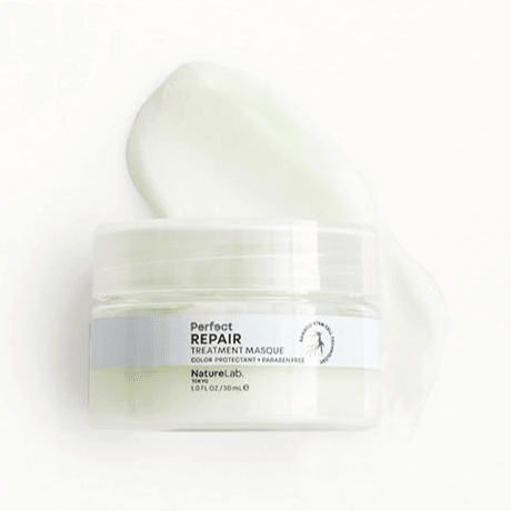 NatureLab Tokyo Perfect Repair Treatment Masque 30ml in jar with cream texture, revitalizing dull hair and protecting color.