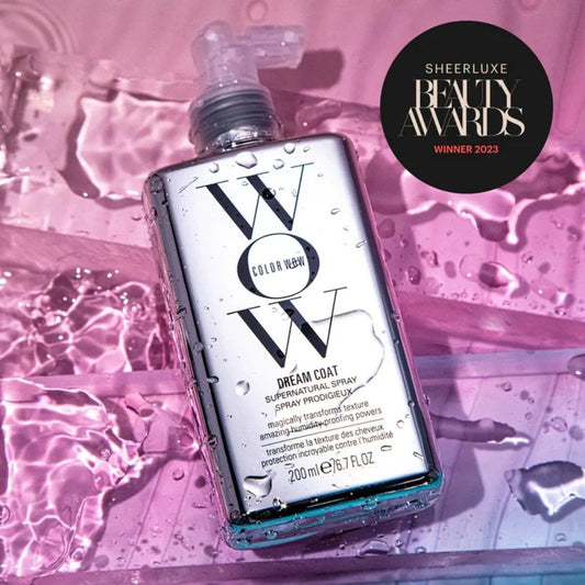 Color Wow hair product bottle on a pink water background with SheerLuxe Beauty Awards logo.