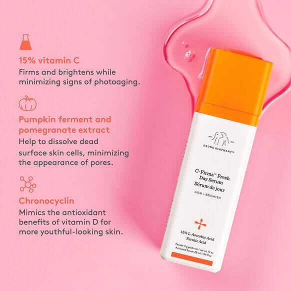 Drunk Elephant C-Firma Fresh Day Serum bottle with ingredients listed on a pink background