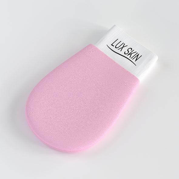 LUX SKIN® Exfoliating Glove in pink, designed to remove dead skin and prevent ingrown hairs for a smoother skin appearance.