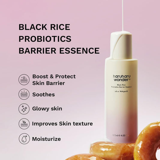 Haruhu wonder black rice probiotics barrier essence bottle with product benefits on a pink background