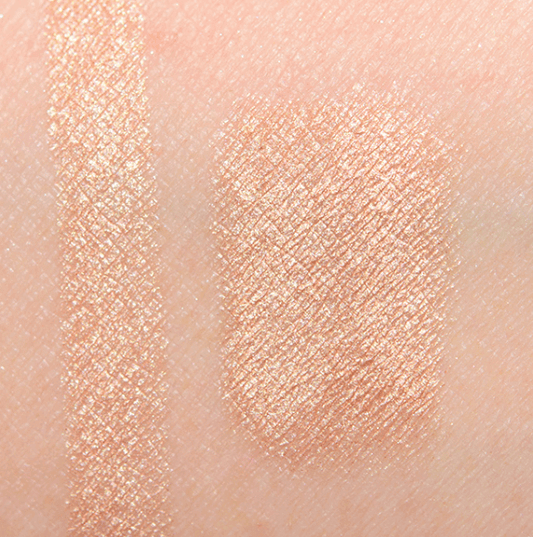 Swatch of Laura Mercier Caviar Stick Eye Shadow Mini in Rosegold showcasing its shimmering finish and color payoff.