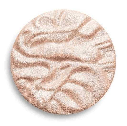 Pale-gold powder highlighter in a round pan, showcasing a silky texture and shimmering finish for radiant skin.