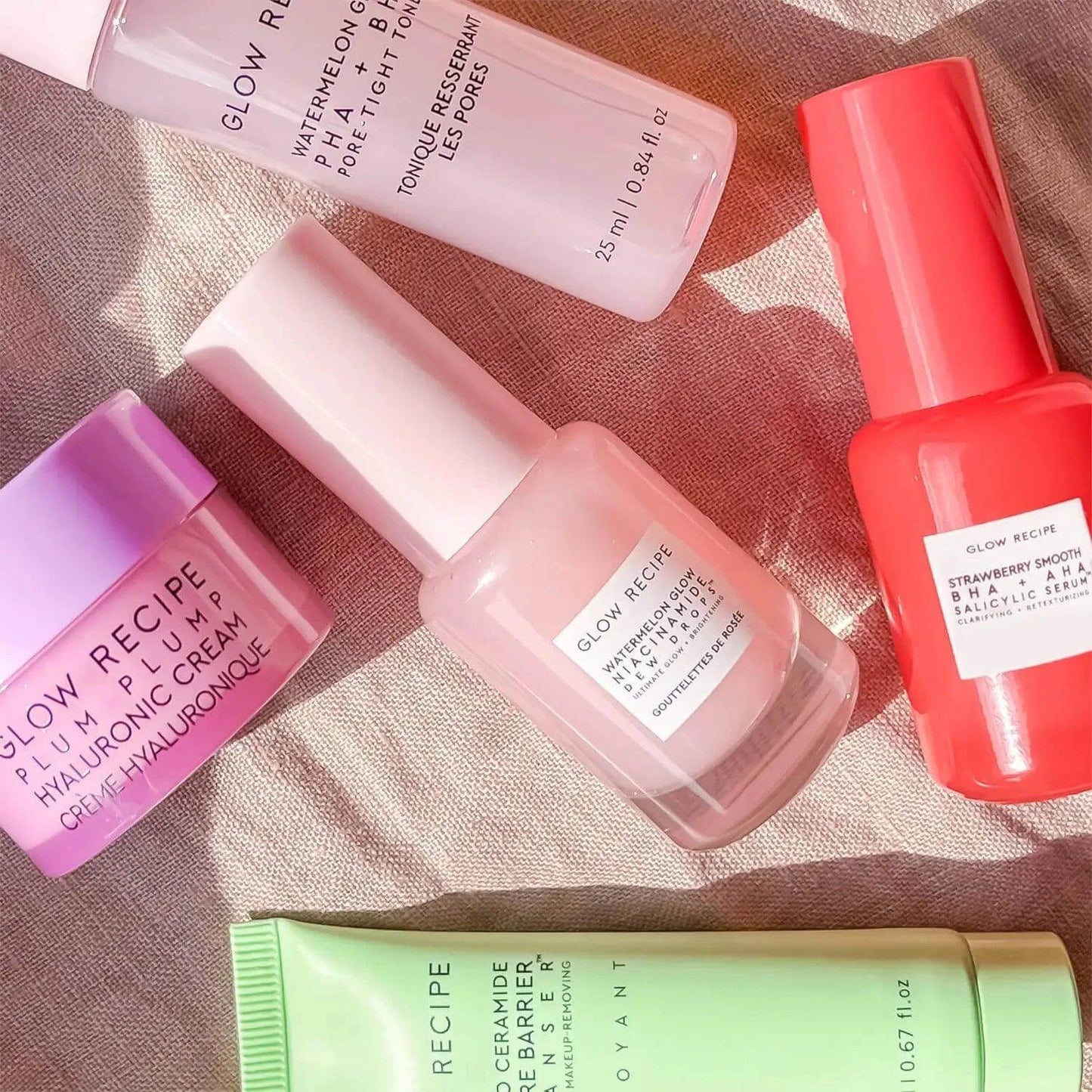 Glow Recipe Fruit Babies Set featuring mini skincare products including hyaluronic cream and watermelon toner.