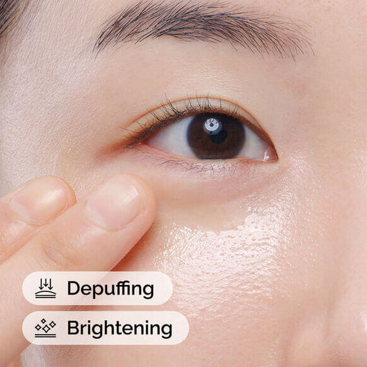Applying The Ordinary Caffeine Solution for depuffing and brightening the eye area.