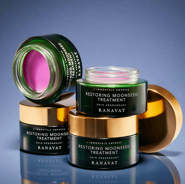 RANAVAT Restoring Moonseed Treatment jars showcasing Ayurvedic skincare benefits for rejuvenating fine lines.