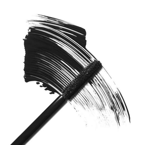 Close-up of a MAC In Extreme Dimension 3D Black Mascara brush with bold black pigment.