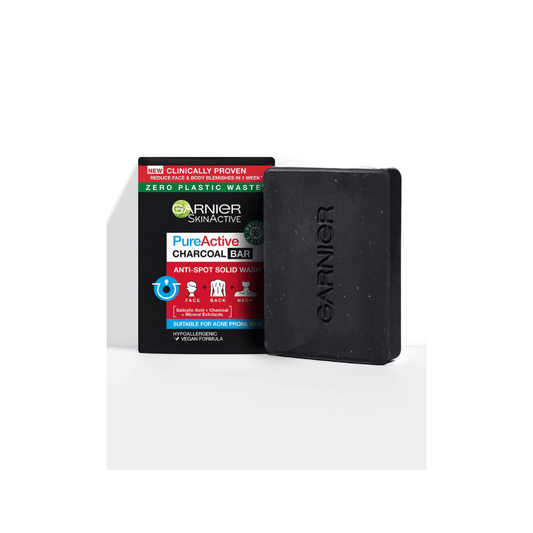 Garnier Pure Active Charcoal Cleansing Bar 100g with packaging, designed for acne-prone skin and clogged pores.