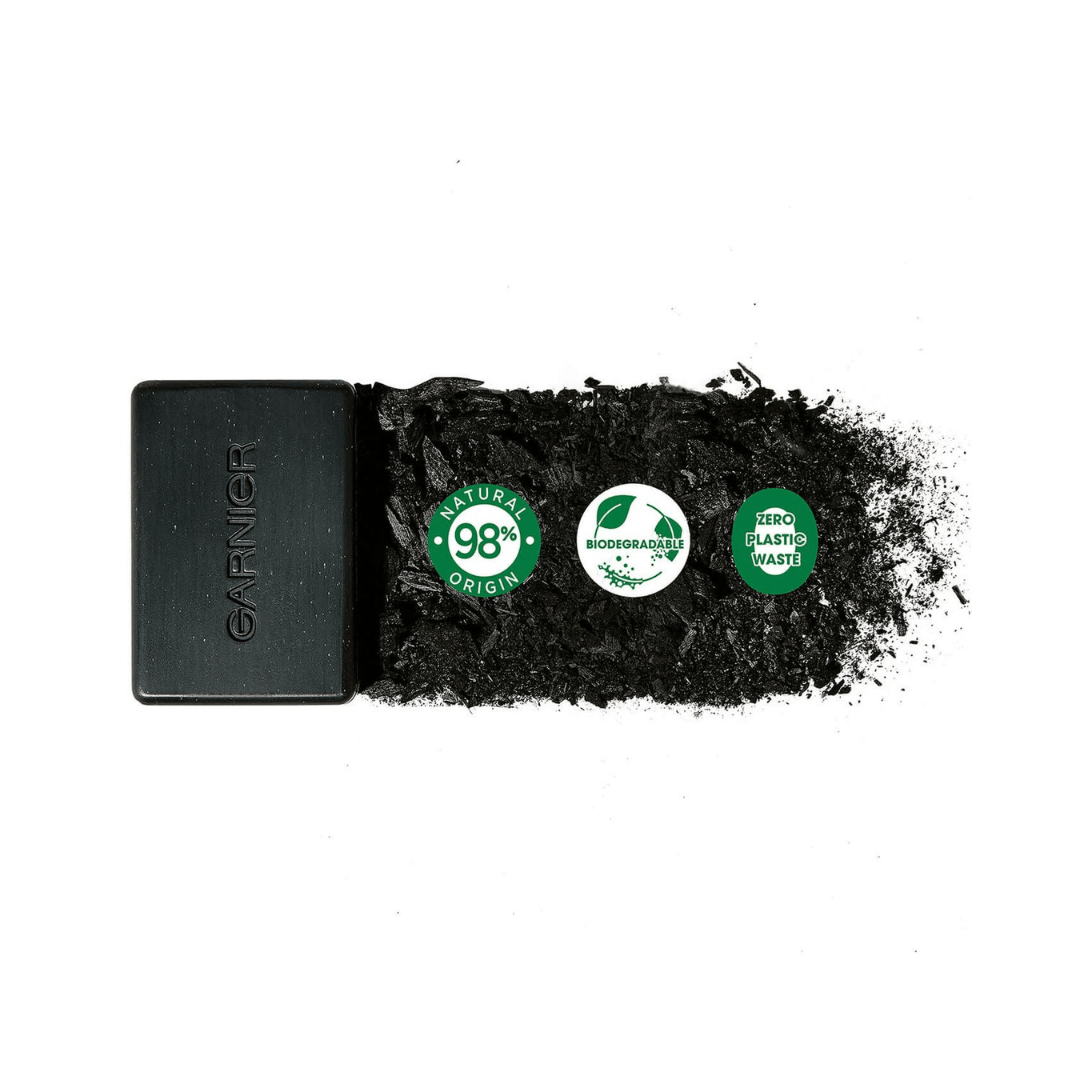 Garnier Pure Active Charcoal Cleansing Bar with eco-friendly badges, showcasing natural origin and zero plastic waste.