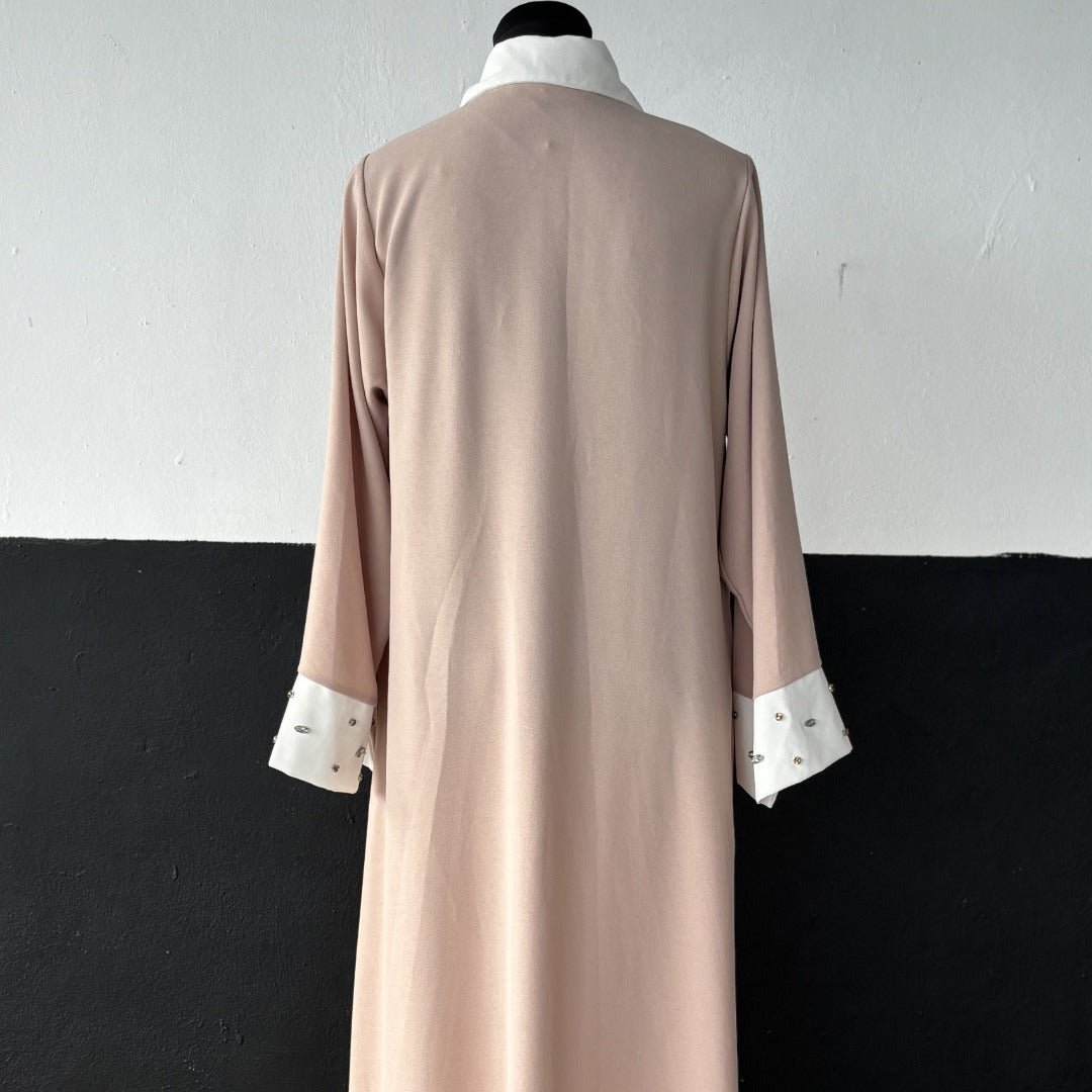 Elegant NED collar dress adorned with sparkling rhinestones for a sophisticated, stylish evening look.