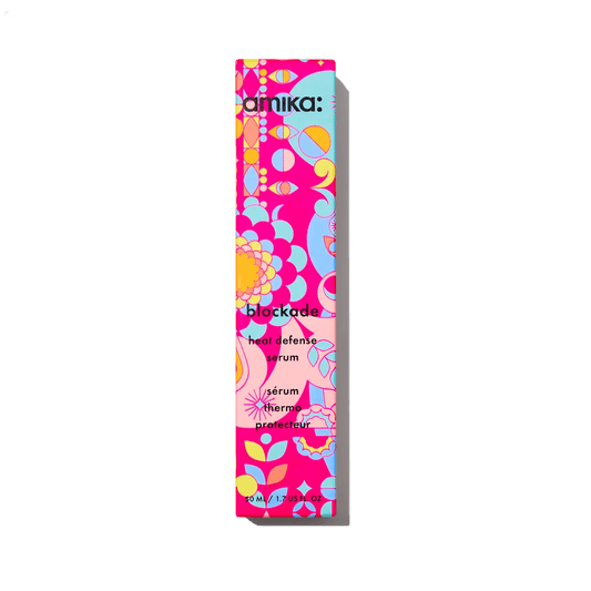 Amika Blockade Heat Defense Serum 50ml packaging, vibrant floral design, ultimate hair protection for styling.