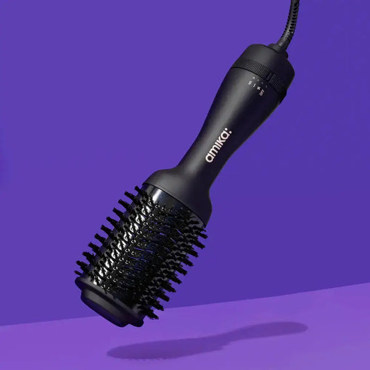 Amika Hair Round Blow Dryer Brush 2.0 in black, ideal for effortless styling and salon-quality results at home.