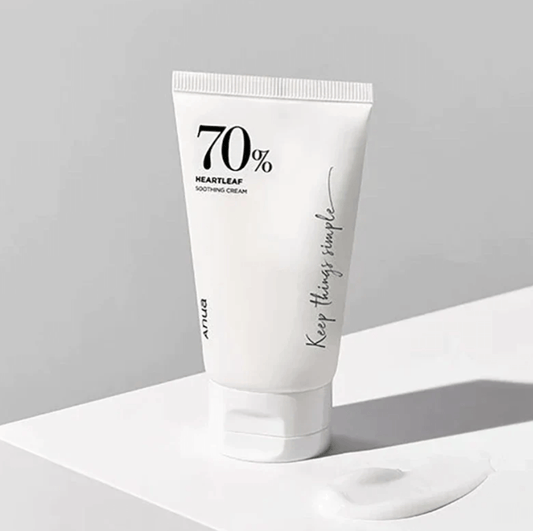 Anua Heartleaf 70% Soothing Cream tube on a white surface, ideal for sensitive skin care and rejuvenation.