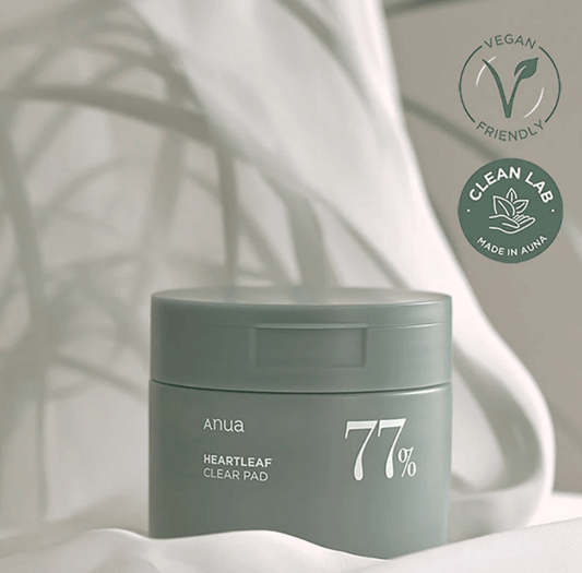 Anua Heartleaf 77% Clear Pad 160ml in a clean setting, showcasing its vegan and clean lab credentials.