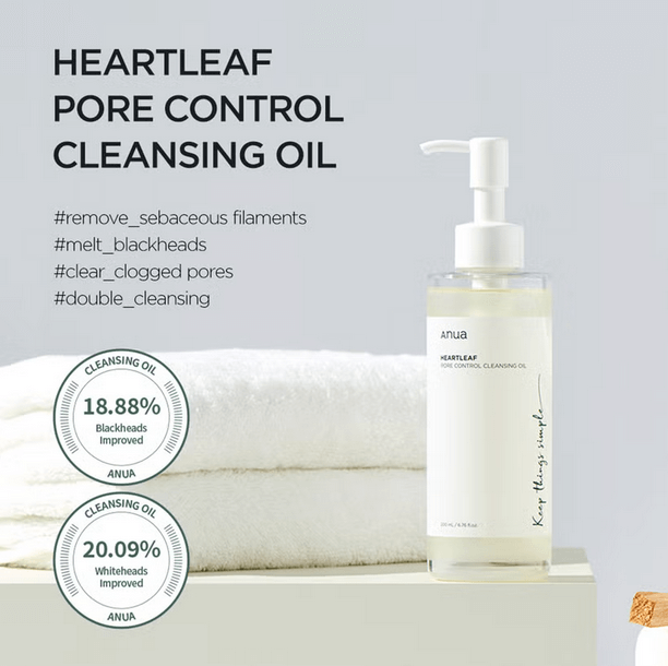 Anua Heartleaf Pore Control Cleansing Oil 200ml for clear pores and reduced blackheads with logo and towels in background.