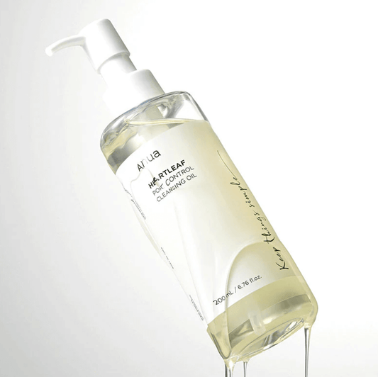 Anua Heartleaf Pore Control Cleansing Oil 200ml bottle with pump for radiant, healthy skin.