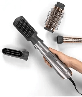 BaByliss Air Style 1000 hair styling tool with interchangeable brushes and attachments.