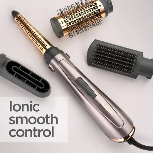 BaByliss Air Style 1000 with interchangeable brush attachments for versatile hair styling.