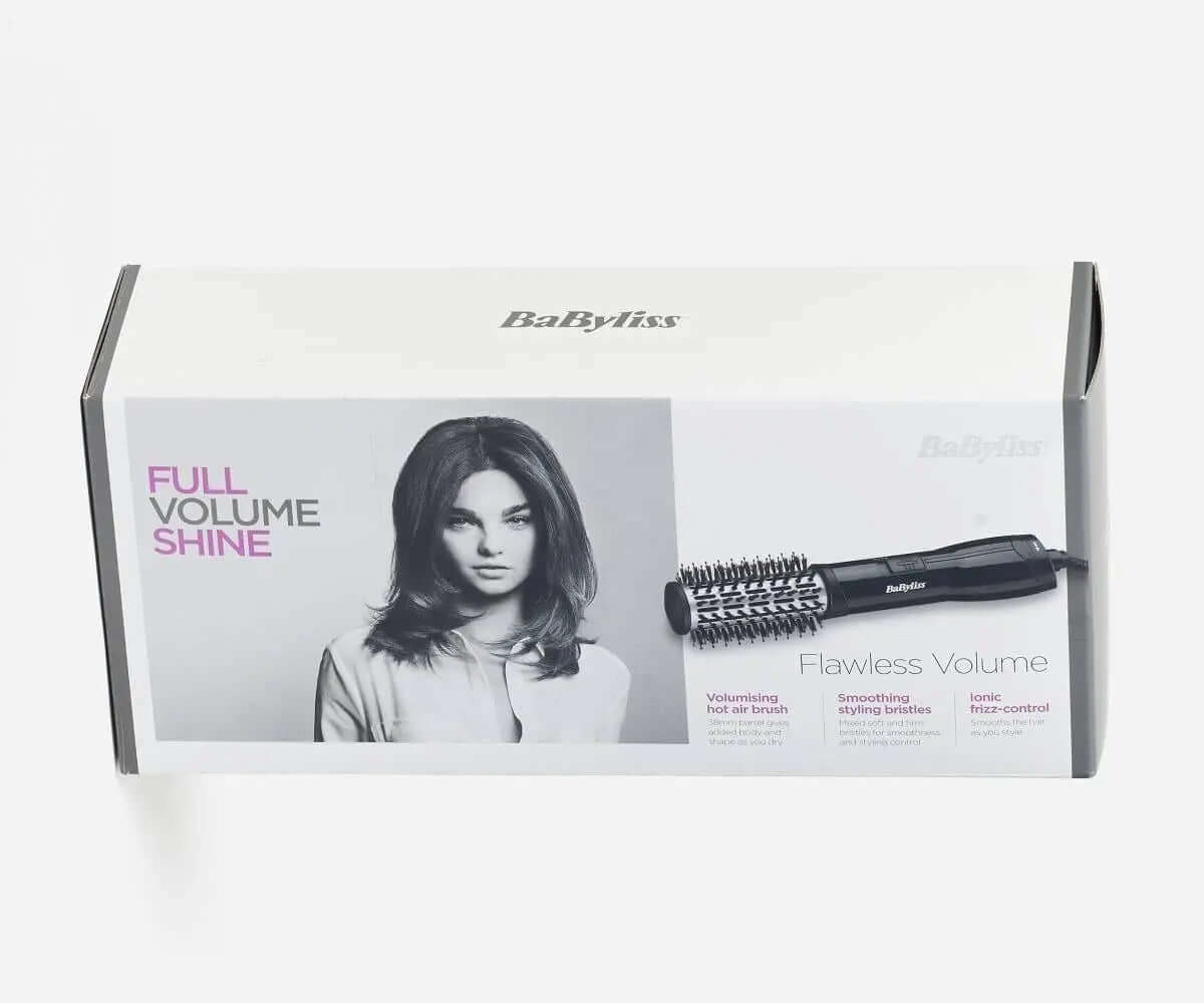BaByliss Flawless Volume Hot Air Styler packaging showcasing volumizing brush and model with full hair shine.