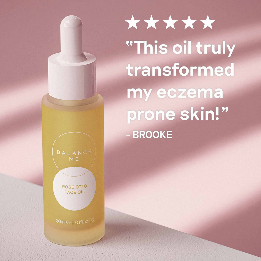 BALANCE ME Yellow face oil bottle with white cap on a pink background, featuring a five-star rating and customer review.