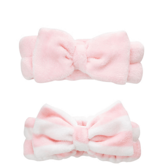 Brushworks Makeup Headbands 2 Pack in pink, featuring soft fabric and decorative bows for comfortable skincare and makeup application.