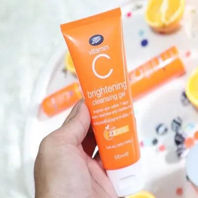 Boots Vitamin C Brightening Cleansing Gel 100ml held in hand, designed for brighter skin and deep cleansing.