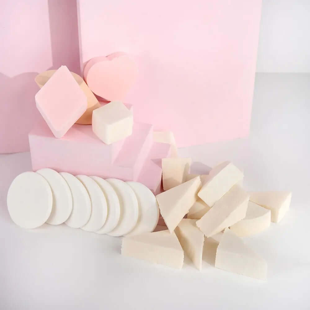 Brushworks assorted makeup sponges in various shapes and sizes, perfect for seamless application of makeup products.