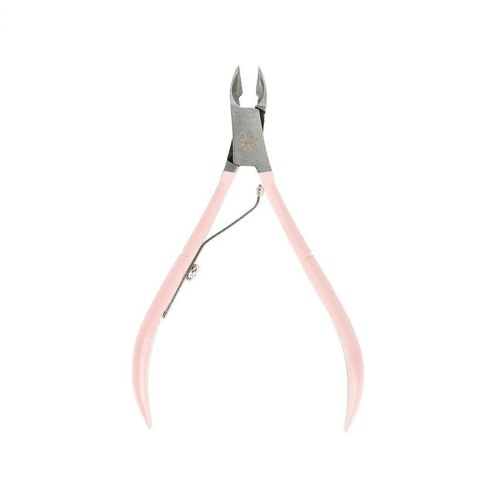 Brushworks Cuticle Nippers in pink, crafted with stainless steel and spring action for precise cuticle removal.